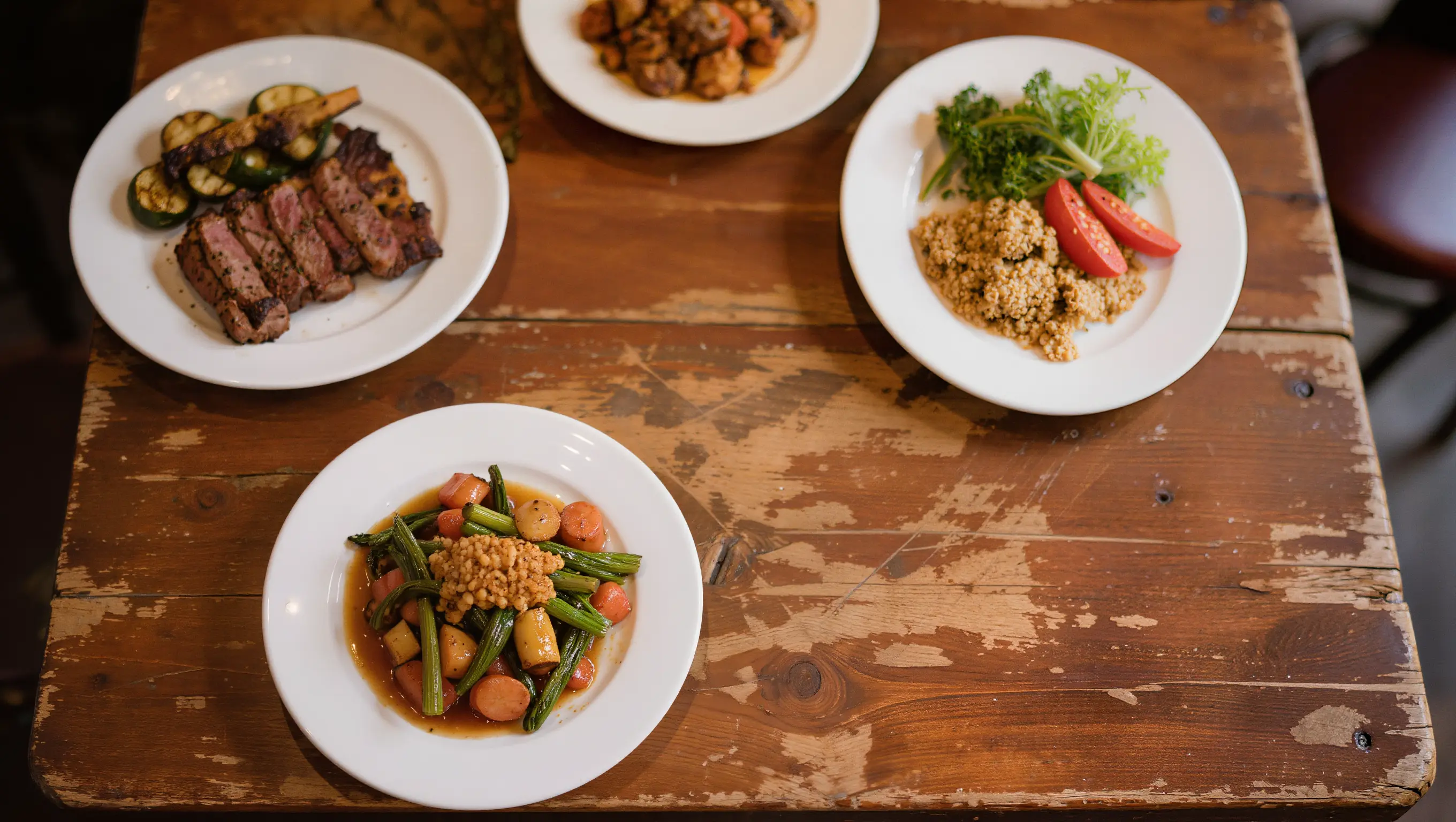A printed restaurant menu on a wooden table